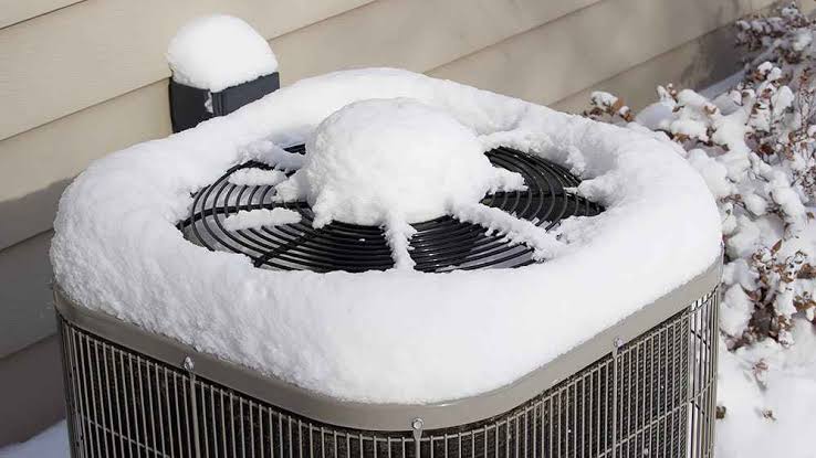 Why Does My Heat Pump Stay Covered in Ice After a Defrost Cycle?